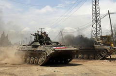 Syrian forces storm rebel bastion of Qusayr