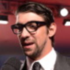 phelps throws cold water on comeback report
